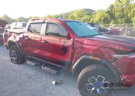 2023 GMC Canyon 4Wd Short Box At4X from USA, damaged, VIN 1GTP6EEK9P1153310